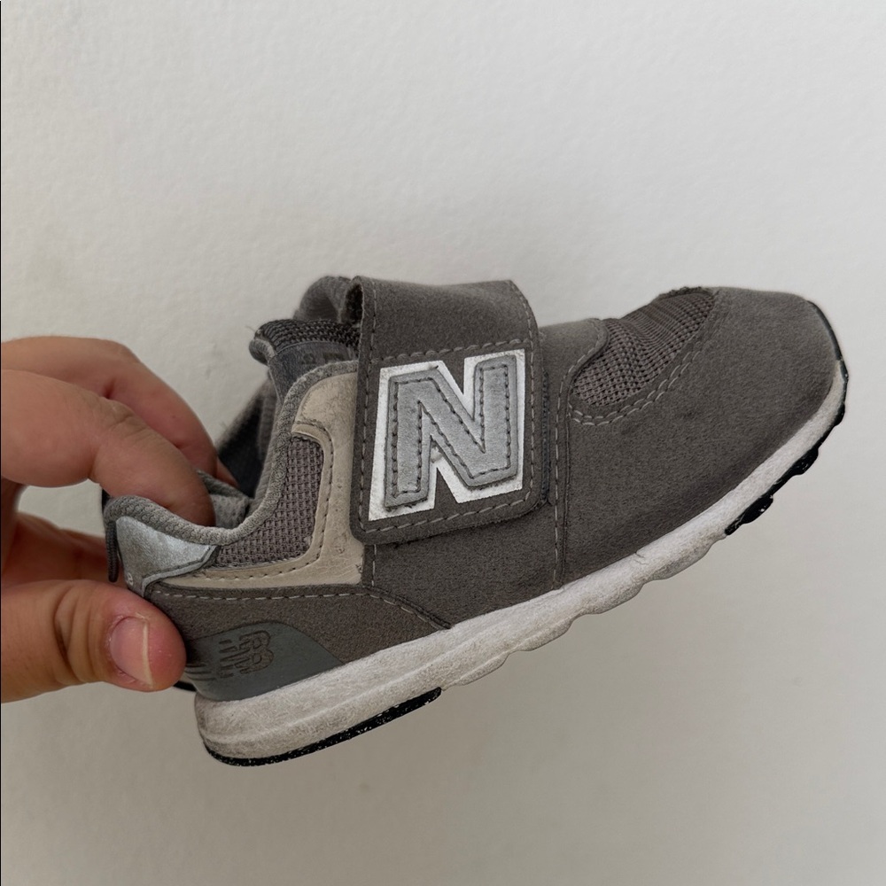 New Balance Kids Charcoal Sneakers 7 wide
